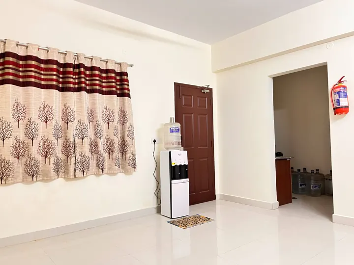 Hallway, stairs and lobby at 7 Hills Service Apartments